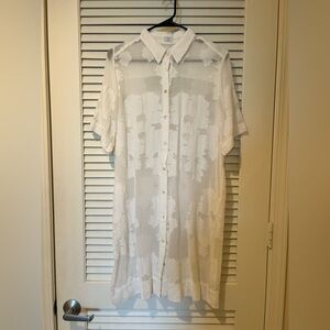 White midi t-shirt style dress with floral details.